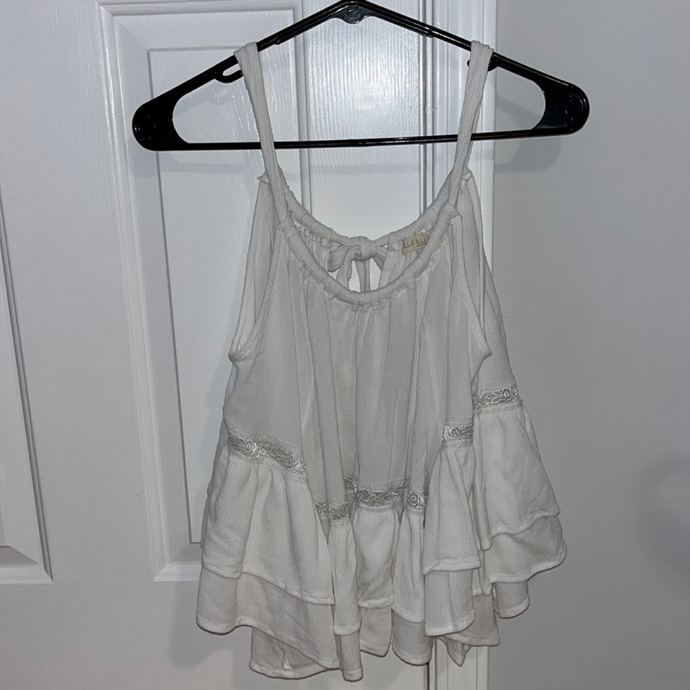 Brooklyn’s white halter flowy tank top